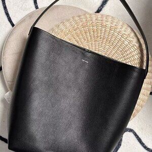 The row black bucket large backpack
